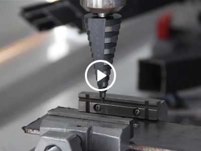 Black straight flute step drill bit test